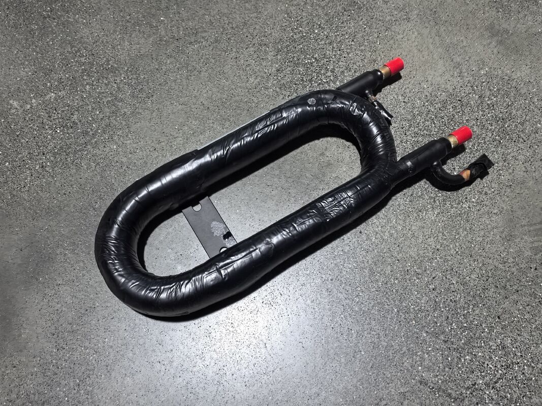 Коаксиальный теплообменник с рабочей температурой от 20°C до 65°C, высотой 520 мм и потоком воды 3 м3/ч для эффективного управления теплом